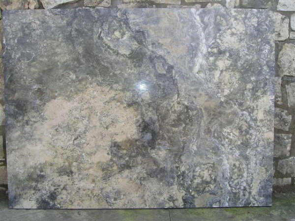 Travertino Grigio Silver Etrusco DARK - cross cutTraverGrigioSilver-Etrusco-DARK-in-the-layer.jpg