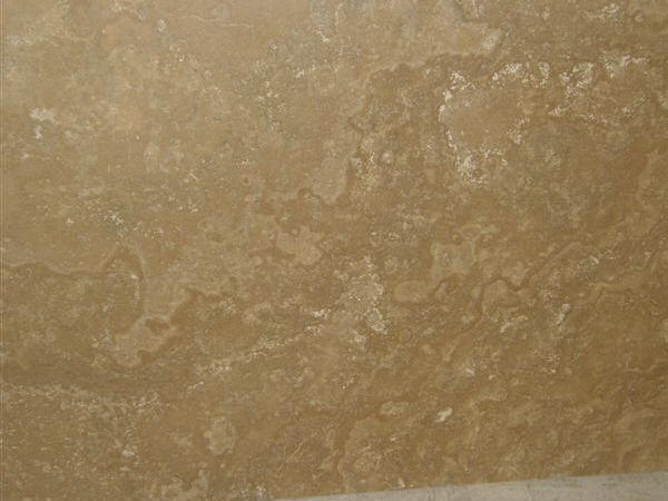 Travertino Noce Montemerano - cross cutTravertino-Noce-Montemerano-in-the-layer.jpg